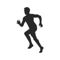 Silhouette of a half-turned man running
